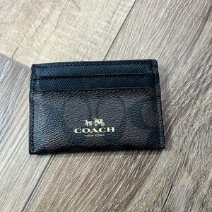 Coach signature Brown/Black card case.